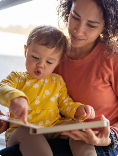 Child Reading With Parent